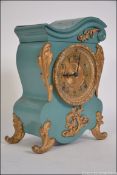 A 19th century painted metal and gilt embellished mantel clock by Ansonia clock co.