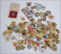 A good collection of enamel badges to include food and drink, advertising, Coca-Cola, McDonalds,