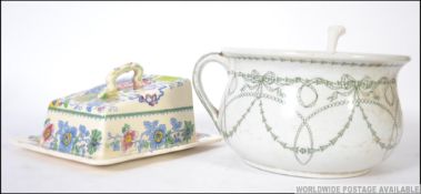 A 20th century mason's cheese dish along with a Royal Doulton chamber pot. Measures: 17cms wide.