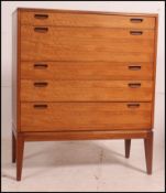 A Danish teak 1970's retro chest of drawers.