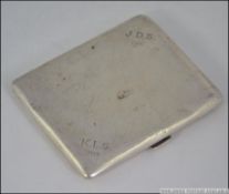 A silver hallmarked cigarette case with monograms and dates for JDS 1906 - KLS 1920.
