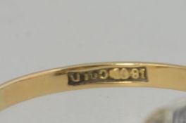 An 18ct gold, sapphire and diamond flower head ring. The 7pnt sapphire surrounded by 1pnt diamonds.