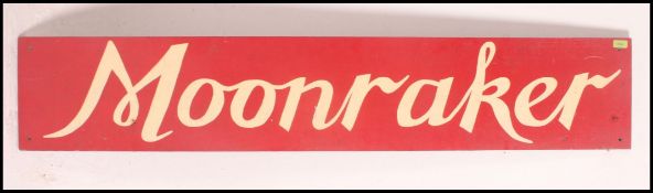 Shop sign a vintage mid 20th century hand painted shop advertising having a red ground with white