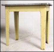 A vintage 20th century polished topped steel surface,