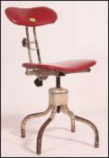 A vintage mid century industrial machinist / draughtmans swivel chair,