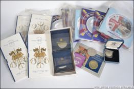 A collection of proof coin sets to include HRH Prince of Wles 50th Birthday commemorative crowns x