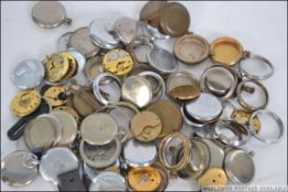 A collection of 19th and 20th century watch cases along with some other watch spairs