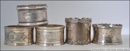 A collection of 3 Victorian silver engraved and hallmarked napkin rings,
