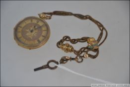 An 18ct gold ladies pocket fob watch, the watch with roman numeral chapter ring,