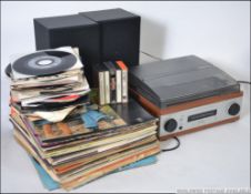 A collection of vinyl Long Play and 45rpm single records dating from the 1960's through to the