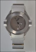 A Storm Friction wristwatch set in stainless steel heavy set case and bracelet,