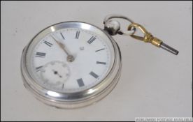 A silver cased hallmarked pocket watch with a subsiduary dial, Roman numeral chapter ring,