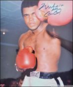 A personally signed colour photograph of Mohammed Ali being complete with the Certificate of