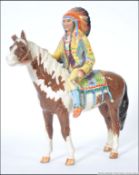 A Beswick figure of a north American Indian, mounted upon a skewbald horse,