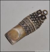 A Victorian style silver whistle in the form of an owl stamped 925 with makers marks 12.