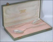 A 1950's cased silver 800 marked pair of salad servers by Wilkens & Soehne, Bremen,