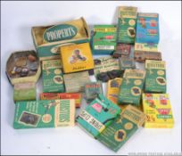 A collection of vintage 1950's Football boot studs - mainly unused in original packets.