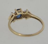 A vintage 10ct gold and sapphire ring.