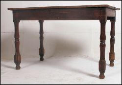 An early 19th century solid planked oak refectory dining table.