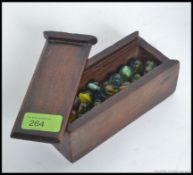 A collection of approx 45x vintage (possibly antique) glass marbles.