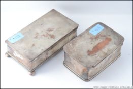 2 19th century silver plated table snuff boxes / cigarette boxes, one on flat bell feet,