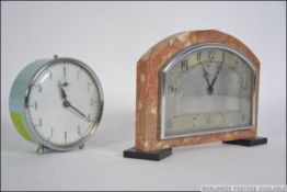 A 1930's Smith Art Deco mantel clock in veined marble case together with a Smiths 1970's military
