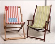 A pair wooden frame deck chairs,