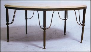 A 1950's marble and gilt metal circular coffee table.