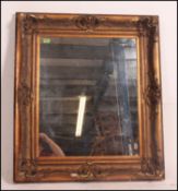 A large Victorian mirror with stunning adams revival gilded frame having mirror to centre with