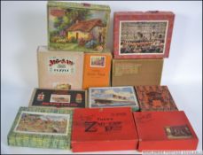A collection of assorted antique and vintage wooden jigsaw puzzles, to include GWR Bath, Queen Mary,