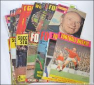 a collection of football magazines datin