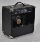 A contemporary music guitar amp marked f