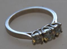 A hallmarked 18ct gold 3 stone diamond r