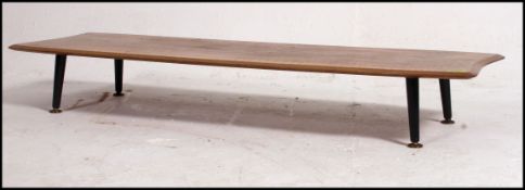 A mid century teak vintage / retro surf