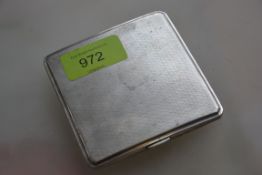 A silver hallmarked cigarette case havin