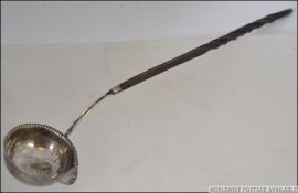 A Georgian pouring ladel - punch spoon w