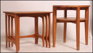 A 1970's Danish influenced teak nest of