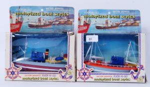 BOATS: Two vintage FHT ' Flick N Go ' Mo