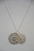 A silver 925 filigree pendant and necklace dating to the 1950's. Size 16