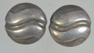 A pair of silver 925 large post backed earrings of geometric wave design. Weighs 7.