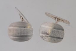 A pair of silver white metal gentlemen's cufflinks marked 830S indicating chinese silver 6.
