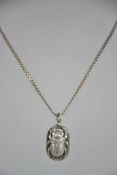 An Egyptian scarab beetle pendant on omega linked necklace chain. The beetle pendant 2.