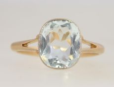 An 18ct gold and diamond ladies vintage ring being set with a beautiful aquamarine stone approx 1.