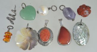 A collection of silver necklace pendants to include abalone, amethyst, agate stone, bloodstone,
