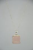 A good silver 925 ladies fine link necklace with rose quartz square pendant having c-clasp to the