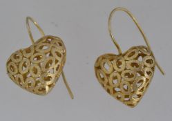A pair of Italian designer 925 vermeil drop earrings with pierced heart decoration. Marked 925.