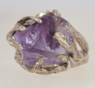 A Spanish silver white metal Brutalist amethyst ring of naturalistic tree branch form holding a