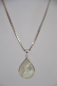 A chunky silver box linked necklace chain with mother of pearl and silver peardrop pendant.