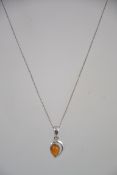 A silver 925 fine curb link necklace chain with C clasp with amber tear drop pendant with cresent