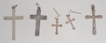 A collection of 3 silver crucifix - cross pendants, 2 being hallmarked.